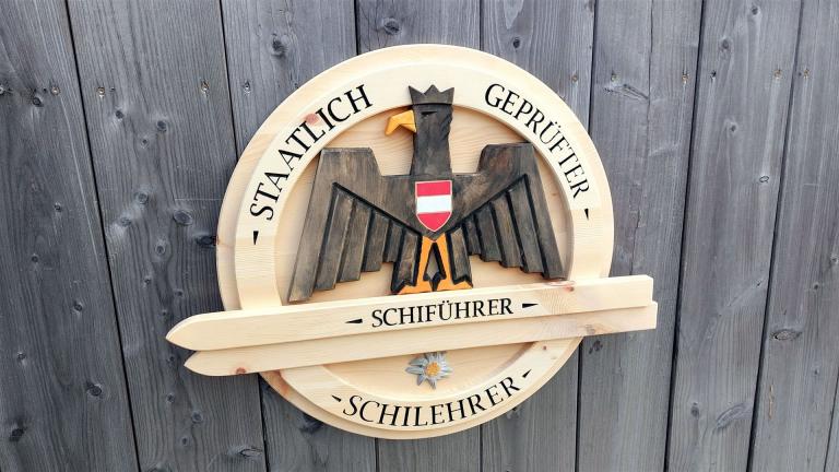 Schilehrer und Schiführer Holzschild
